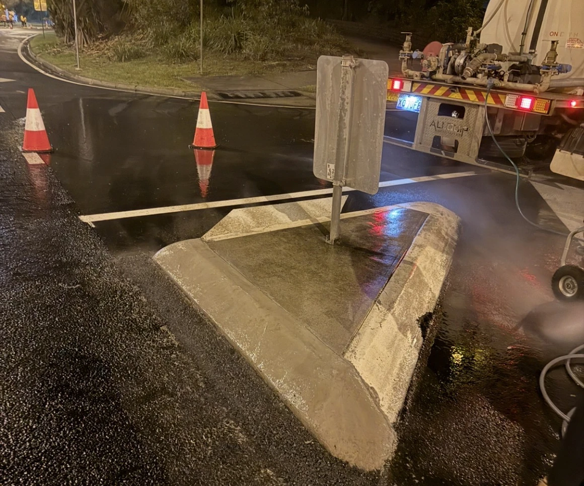 Nighttime road work with traffic cones